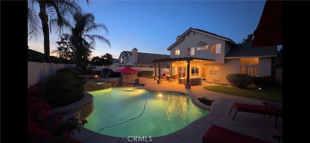 view of pool with a fenced in pool, a patio, a pergola, an in ground hot tub, and a fenced backyard