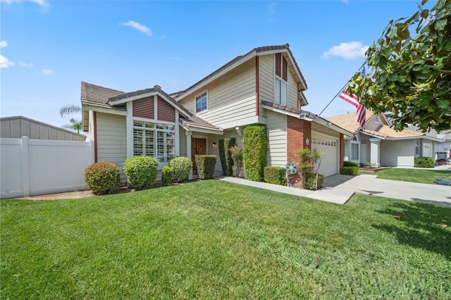 traditional home featuring fence, an attached garage, a front lawn, and concrete driveway