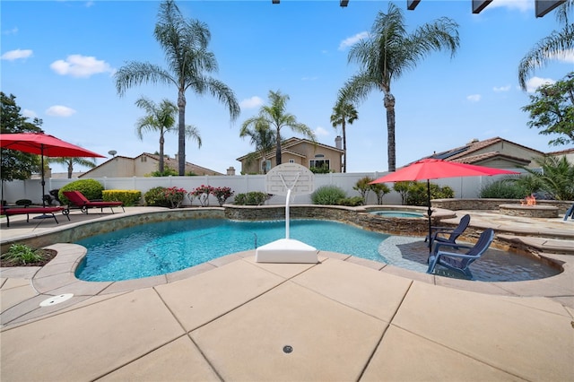 view of pool featuring a patio, an in ground hot tub, a fenced in pool, and a fenced backyard