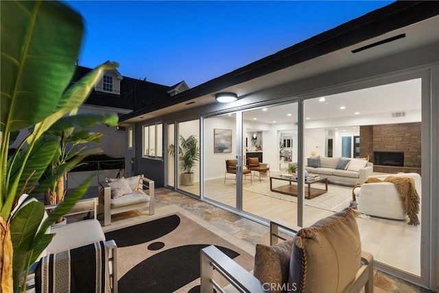 view of patio with visible vents and outdoor lounge area