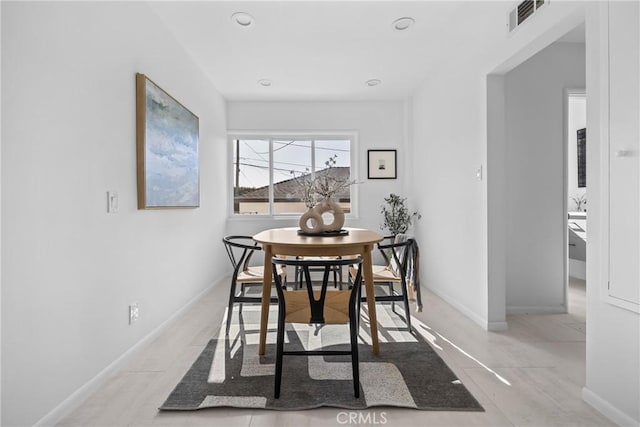 dining area featuring visible vents, baseboards, and recessed lighting