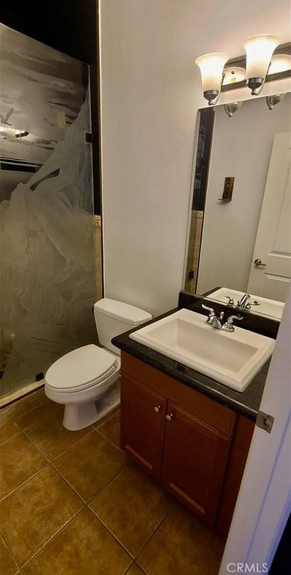 1500 Pine Ave Unit 19, Long Beach, CA 90813 - bathroom featuring vanity, tile patterned floors, toilet, and a shower stall
