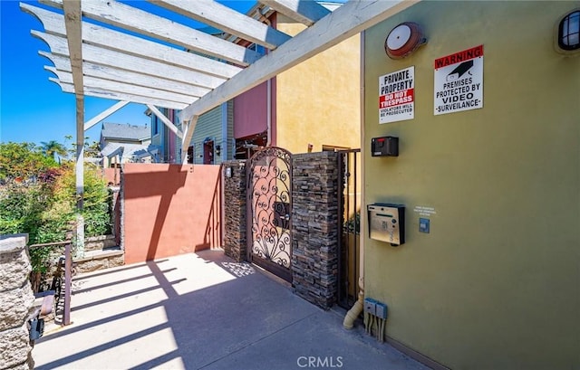 1500 Pine Ave Unit 19, Long Beach, CA 90813 - view of patio with a pergola and a gate