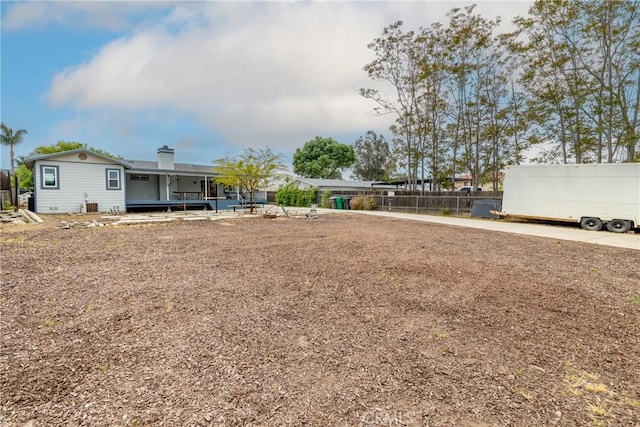 view of yard featuring fence