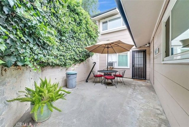 view of patio featuring outdoor dining space