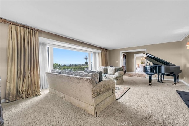 living room with baseboards and carpet floors