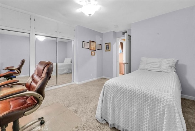 bedroom featuring light carpet, baseboards, and visible vents