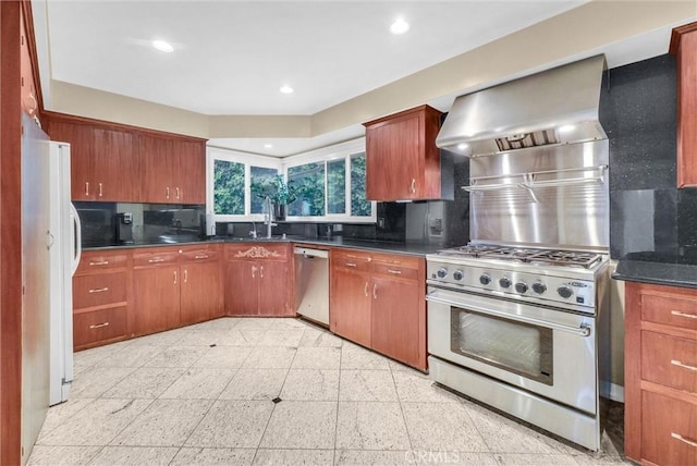 kitchen featuring extractor fan, stainless steel appliances, and backsplash