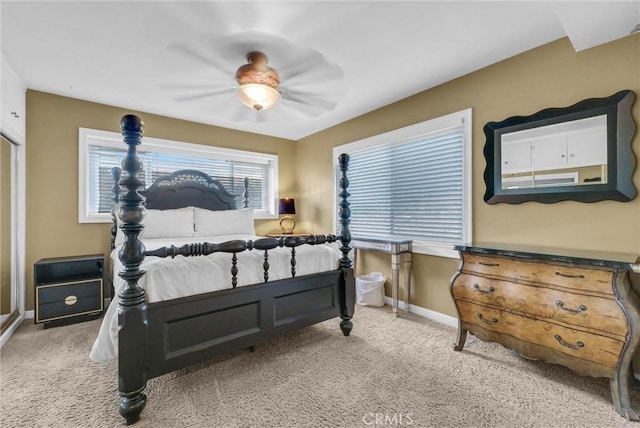 bedroom featuring carpet flooring, baseboards, and ceiling fan