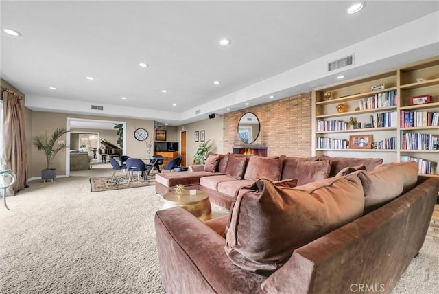 carpeted living room featuring recessed lighting and visible vents