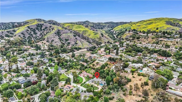 drone / aerial view with a residential view and a mountain view