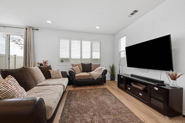 5441 San Roberto, San Diego, CA 92154 - living area featuring light wood finished floors, a wealth of natural light, visible vents, and recessed lighting