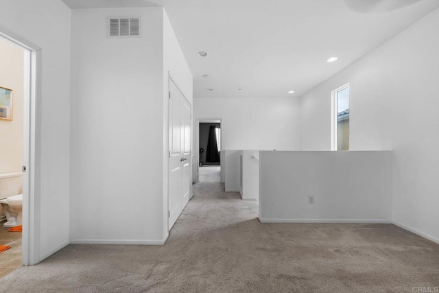 5441 San Roberto, San Diego, CA 92154 - spare room featuring light colored carpet, visible vents, baseboards, and recessed lighting