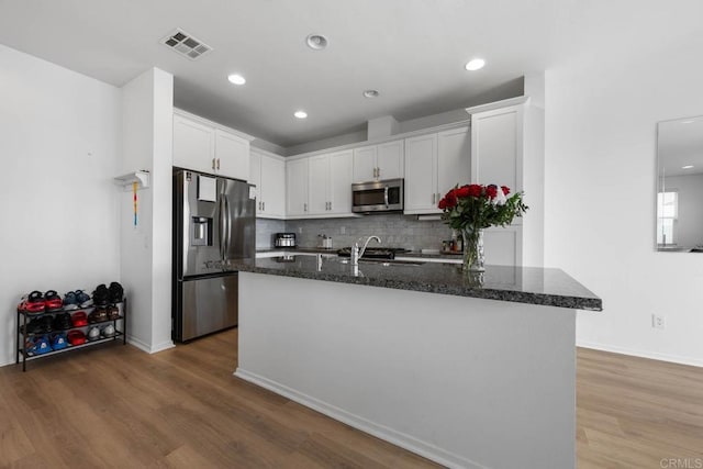 5441 San Roberto, San Diego, CA 92154 - kitchen featuring white cabinetry, stainless steel appliances, visible vents, and a sink