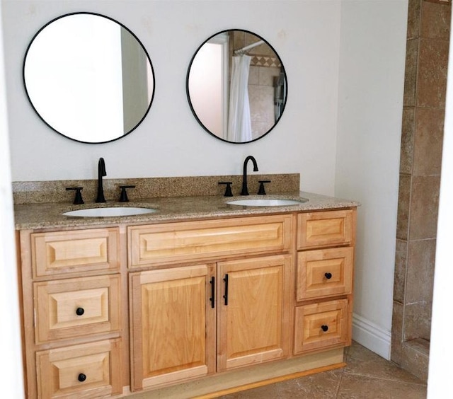 14879 Heather Glen Way, San Diego, CA 92128 - bathroom featuring double vanity, curtained shower, and tile patterned floors