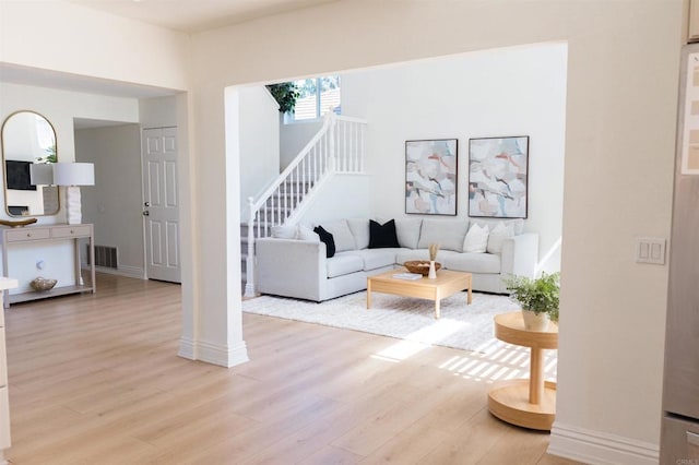 14879 Heather Glen Way, San Diego, CA 92128 - living area featuring light wood-style floors and stairs
