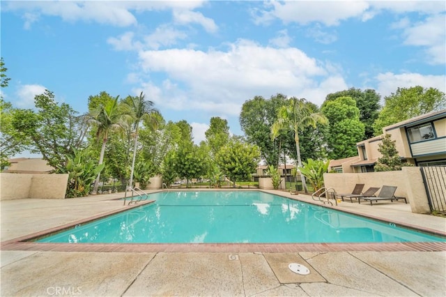 1840 S Summer Pl, West Covina, CA 91792 - community pool featuring a patio area and fence