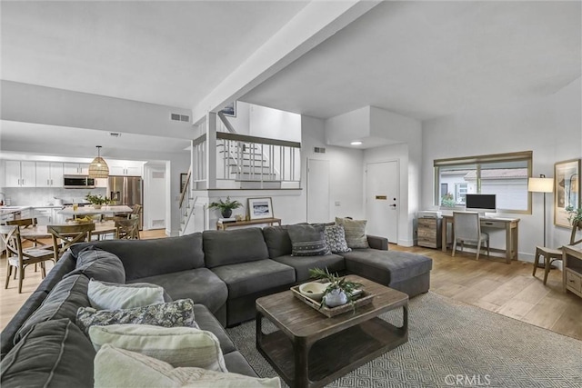 1 Vista Del Ponto, San Clemente, CA 92672 - living area featuring stairs, visible vents, and light wood-style floors