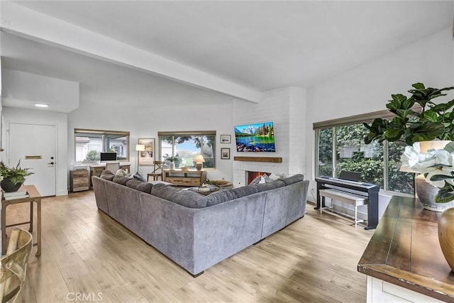 1 Vista Del Ponto Unit 83, San Clemente, CA 92672 - living room with light wood-style flooring and a brick fireplace