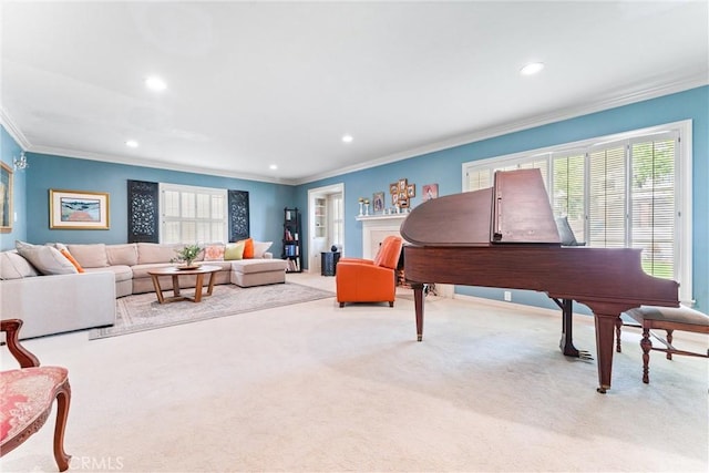 carpeted living area featuring ornamental molding and recessed lighting