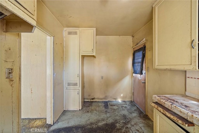 kitchen with concrete flooring