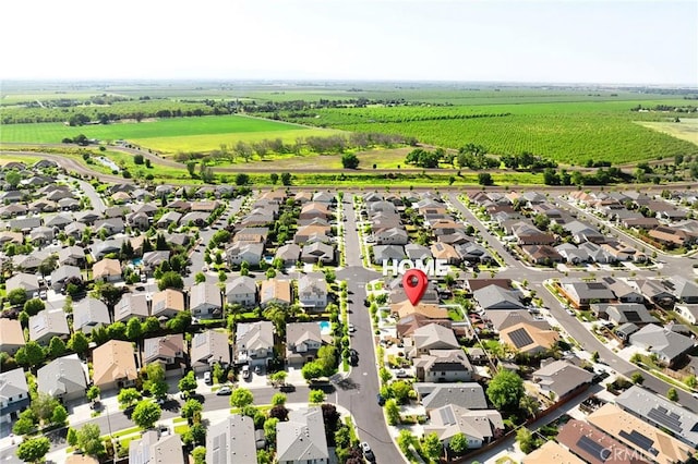 aerial view featuring a rural view and a residential view