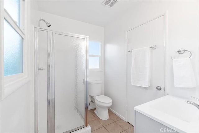 full bath with toilet, visible vents, tile patterned flooring, and a stall shower