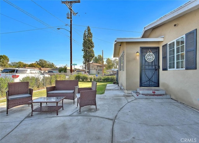 1261 W 13th St, San Bernardino, CA 92411 - view of patio / terrace with fence and an outdoor hangout area