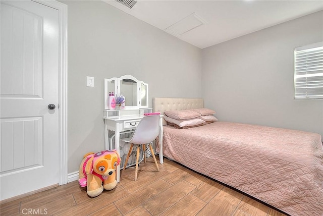 1261 W 13th St, San Bernardino, CA 92411 - bedroom with visible vents and wood finished floors