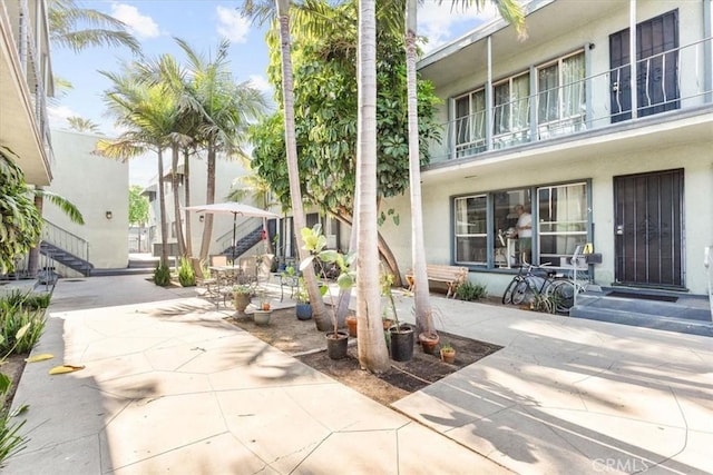 view of property's community featuring a patio