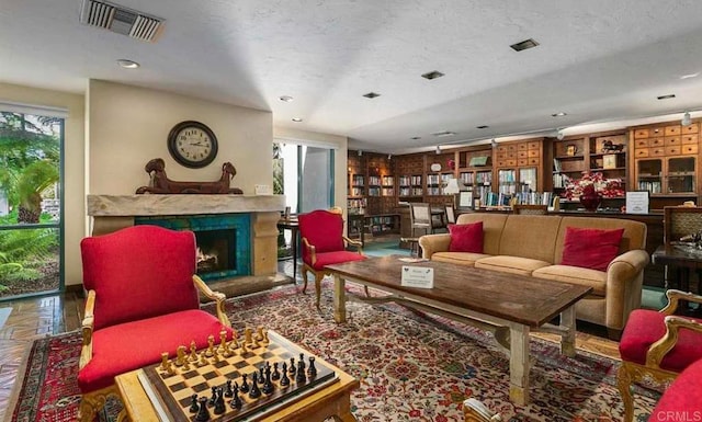 4704 Cordoba Way, Oceanside, CA 92056 - living room featuring recessed lighting, a fireplace, and visible vents
