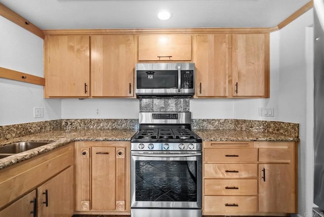 4704 Cordoba Way, Oceanside, CA 92056 - kitchen featuring stone counters, light brown cabinetry, and appliances with stainless steel finishes