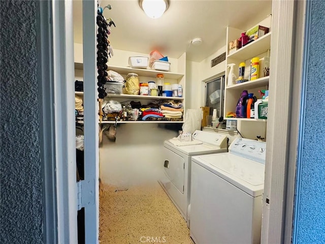 laundry room featuring laundry area and washer and clothes dryer