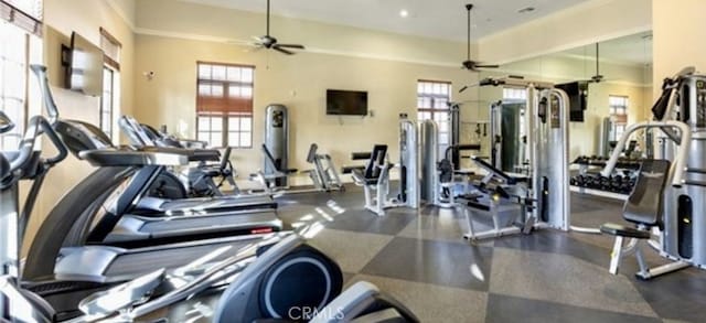 exercise room with a ceiling fan, ornamental molding, and recessed lighting