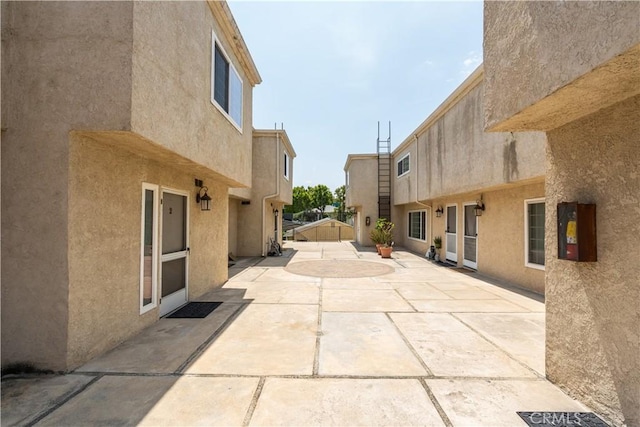 surrounding community with a patio area