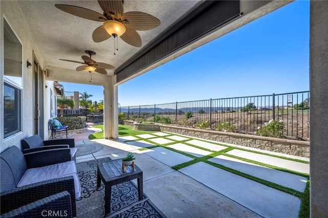 38493 Falkirk Dr, Murrieta, CA 92563 - fenced backyard with ceiling fan and a patio area