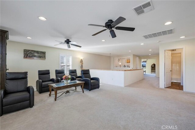 38493 Falkirk Dr, Murrieta, CA 92563 - living area featuring light carpet, recessed lighting, and ceiling fan
