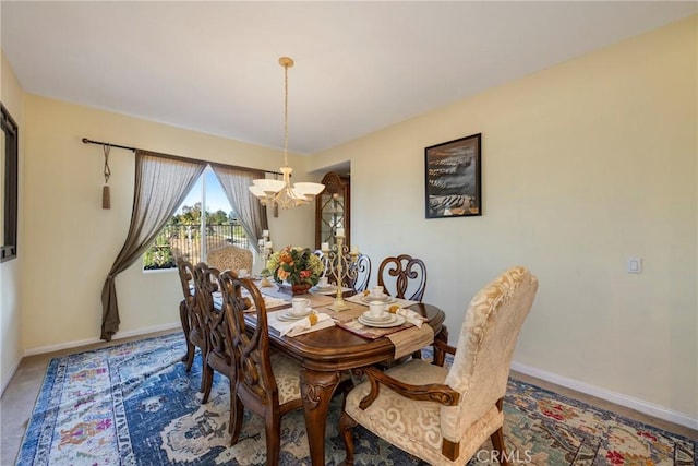 38493 Falkirk Dr, Murrieta, CA 92563 - dining area featuring a chandelier and baseboards