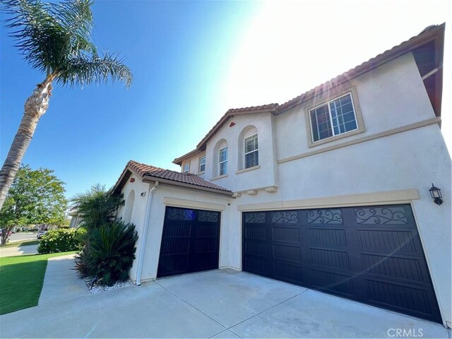 38493 Falkirk Dr, Murrieta, CA 92563 - view of front of house with stucco siding and a tiled roof