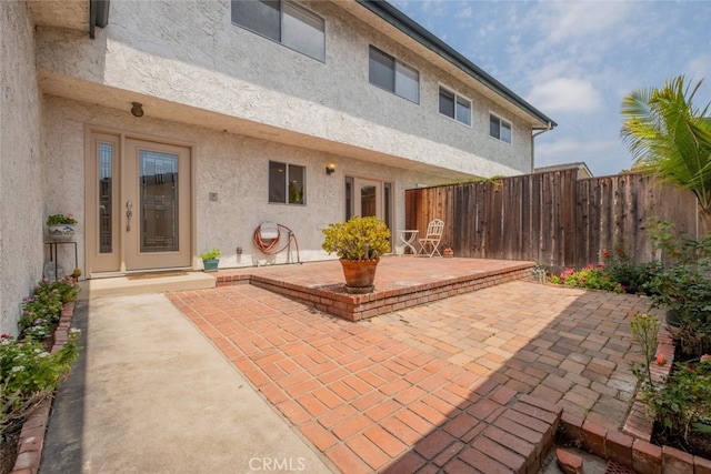 view of patio / terrace with fence