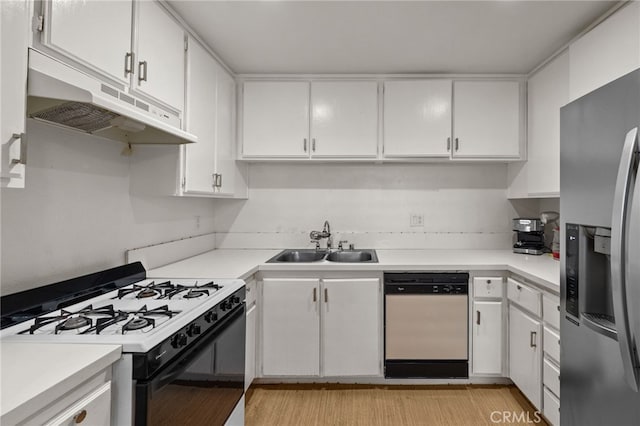 kitchen with a sink, dishwasher, under cabinet range hood, gas range oven, and stainless steel fridge with ice dispenser