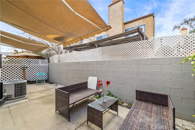 view of patio with central air condition unit and a fenced backyard