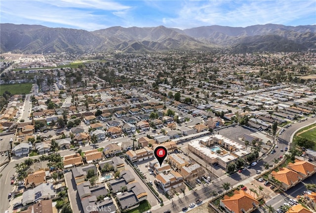drone / aerial view with a mountain view and a residential view