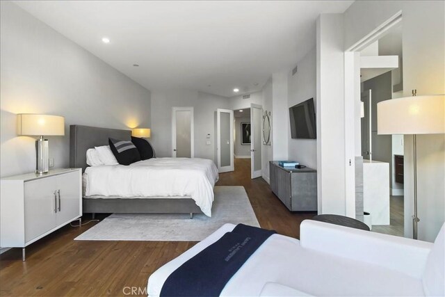 22065 Pacific Coast Hwy Unit 3, Malibu, CA 90265 - bedroom with baseboards, recessed lighting, and wood finished floors