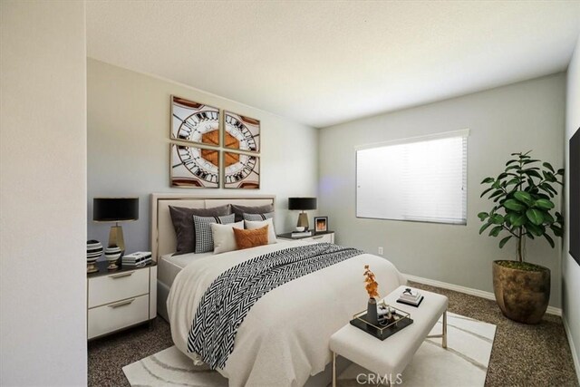 13167 Hollister St, Hesperia, CA 92344 - bedroom with dark colored carpet and baseboards