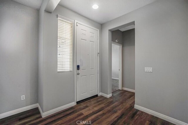 13167 Hollister St, Hesperia, CA 92344 - foyer featuring plenty of natural light, baseboards, and dark wood-style flooring