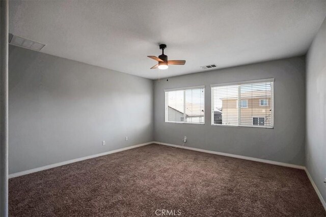 13167 Hollister St, Hesperia, CA 92344 - carpeted spare room featuring a ceiling fan and baseboards