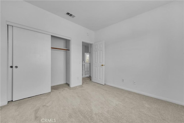 43629 Rucker Ct, Lancaster, CA 93535 - unfurnished bedroom with baseboards, a closet, visible vents, and carpet floors