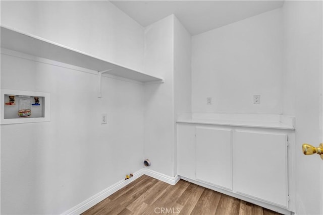 43629 Rucker Ct, Lancaster, CA 93535 - laundry room featuring baseboards, gas dryer hookup, hookup for a washing machine, and wood finished floors