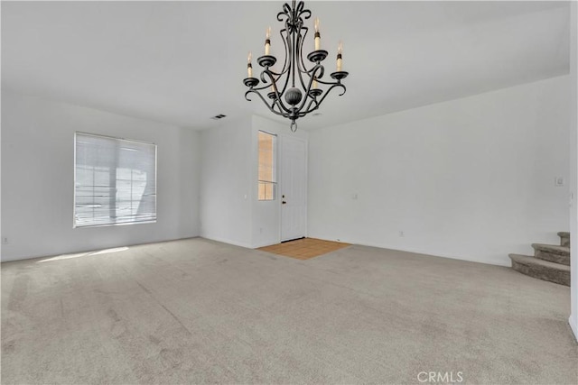 43629 Rucker Ct, Lancaster, CA 93535 - interior space featuring an inviting chandelier, stairway, and visible vents